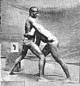 Indian wrestlers preparing for a throw.