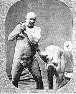 Indian wrestlers demonstrating arm bar with wrist lock